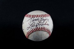 Baseball from Red Sox game with Larry Lucchino's signature